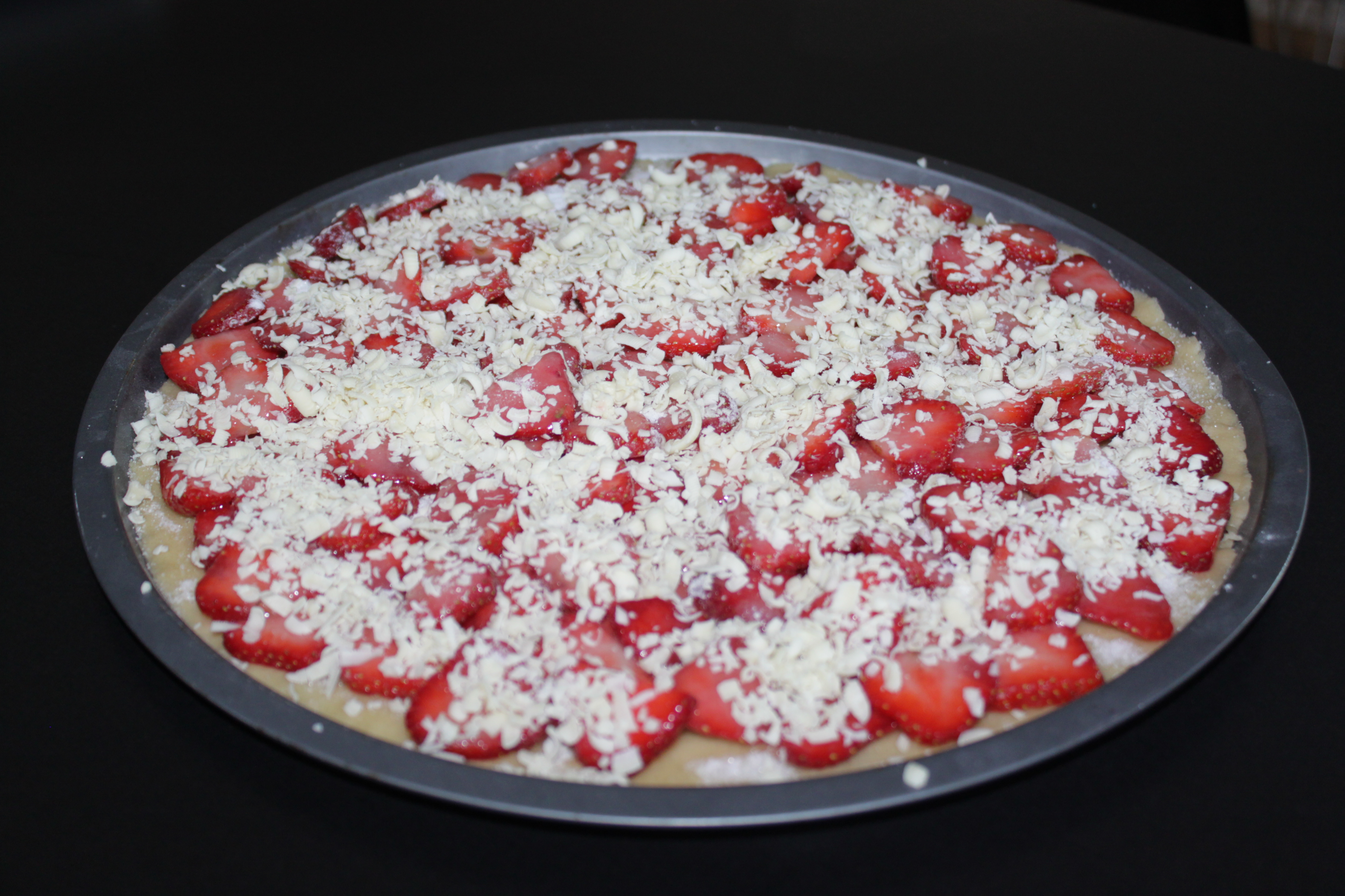 Fördela den rivna vita chokladen.